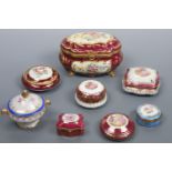 A Limoges lidded box, 17 x 10 cm high and six other Limoges lidded boxes etc.