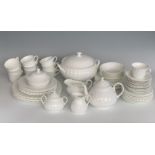 An extensive suite of Wedgwood white fluted Cascade pattern tea and dinner ware