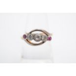 A vintage ruby, diamond and white stone ring, the brilliants millegrain-set diagonally within an