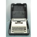 A Triumph Adler Junior portable typewriter