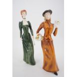 Two Royal Doulton figurines; A La Mode HN 2544, 32 cm high and Eliza HN 2543, 30 cm high