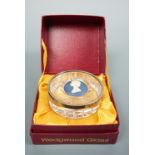 A Wedgwood Queen Elizabeth II Silver Jubilee silver-collared glass paperweight, cased