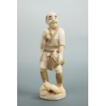A Meiji Japanese carved ivory okimono depicting a jovial fisherman, character mark to base, 13 cm