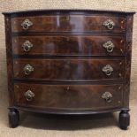 A fine early Victorian inlaid-mahogany chest of drawers, having brass ring handles, turned mouldings