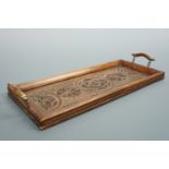 A small Gothic chip-carved wooden tray, 35 cm x 14 cm