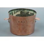 A Victorian copper lugged pan, bearing struck initials E M K, 15 cm x 10.5 cm high