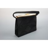 A 1940s 'Genuine Corde Product' lady's handbag, in fine black cord with faux mother-of-pearl cantle,
