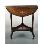 A Victorian inlaid rosewood triple drop leaf occasional table