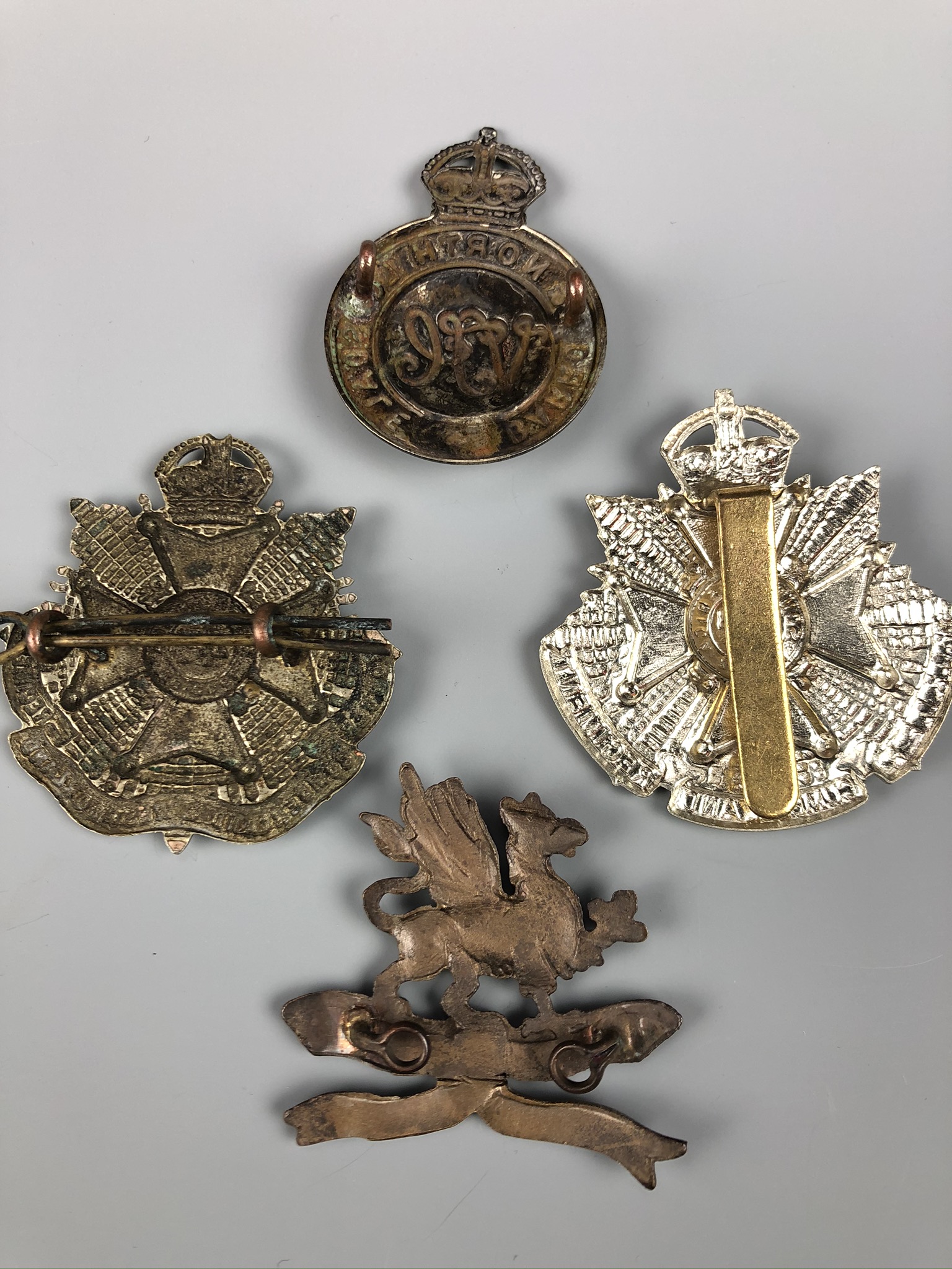 An 11th (Lonsdale) Battalion Officer's Service Dress cap badge together with 4th and 5th Battalion - Image 2 of 2