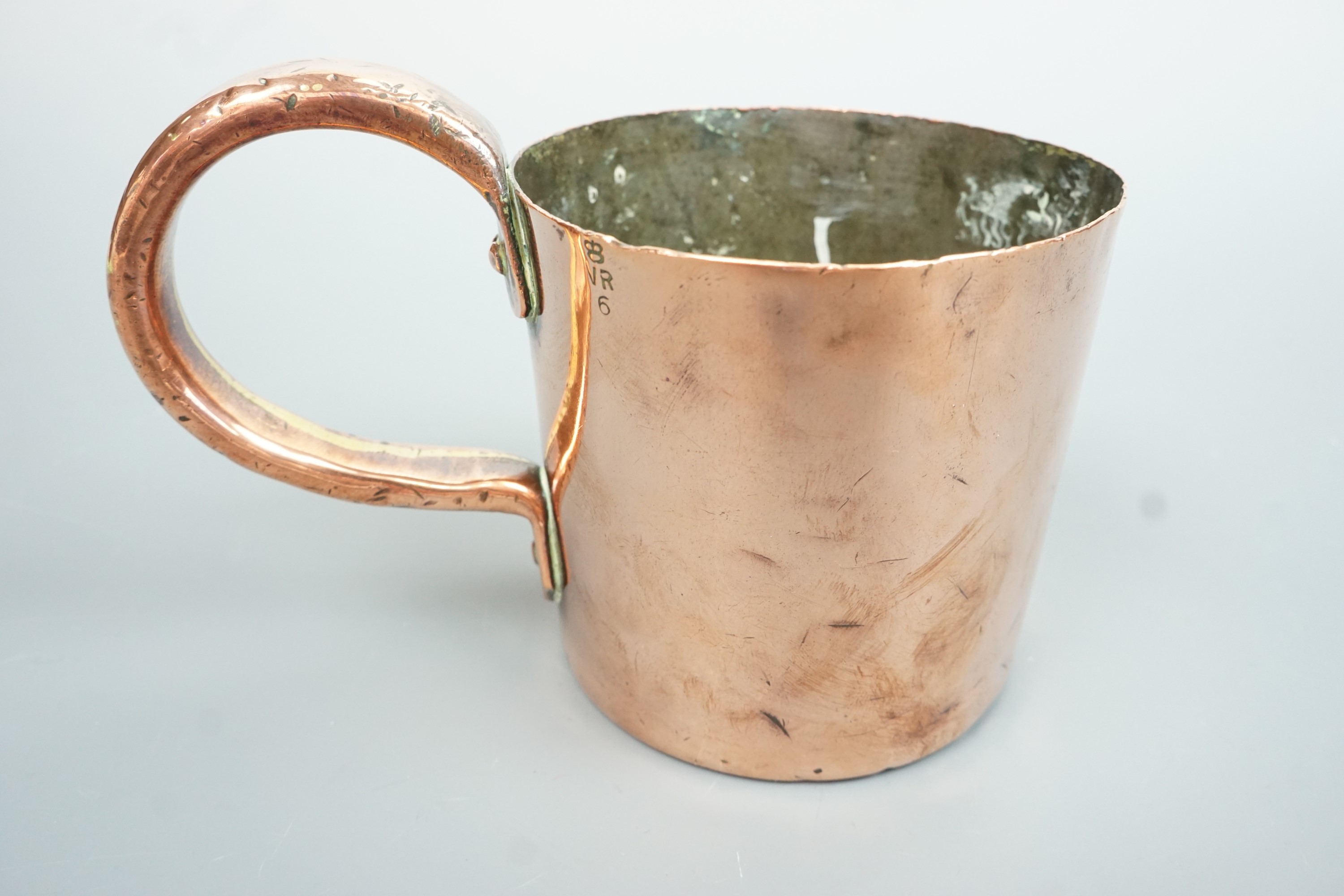 A Victorian Royal Navy copper 1 Pint rum / grog measure, 10.5 cm high