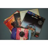 A quantity of LPs including ABBA, Billy Connolly etc. and a small quantity of single records