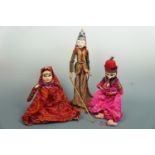 Three South Asian wooden dancing puppets, tallest 48 cm