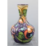 A Moorcroft vase, trial piece, 12.12.02, 10 cm high,
