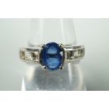 A contemporary Himalayan Kyanite and white topaz dress ring, on sterling silver, size R 1/2, with