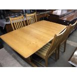 An Ercol ash dining suite
