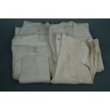 A quantity of vintage gentlemen's summer white cotton clothing including a jacket, waistcoat,