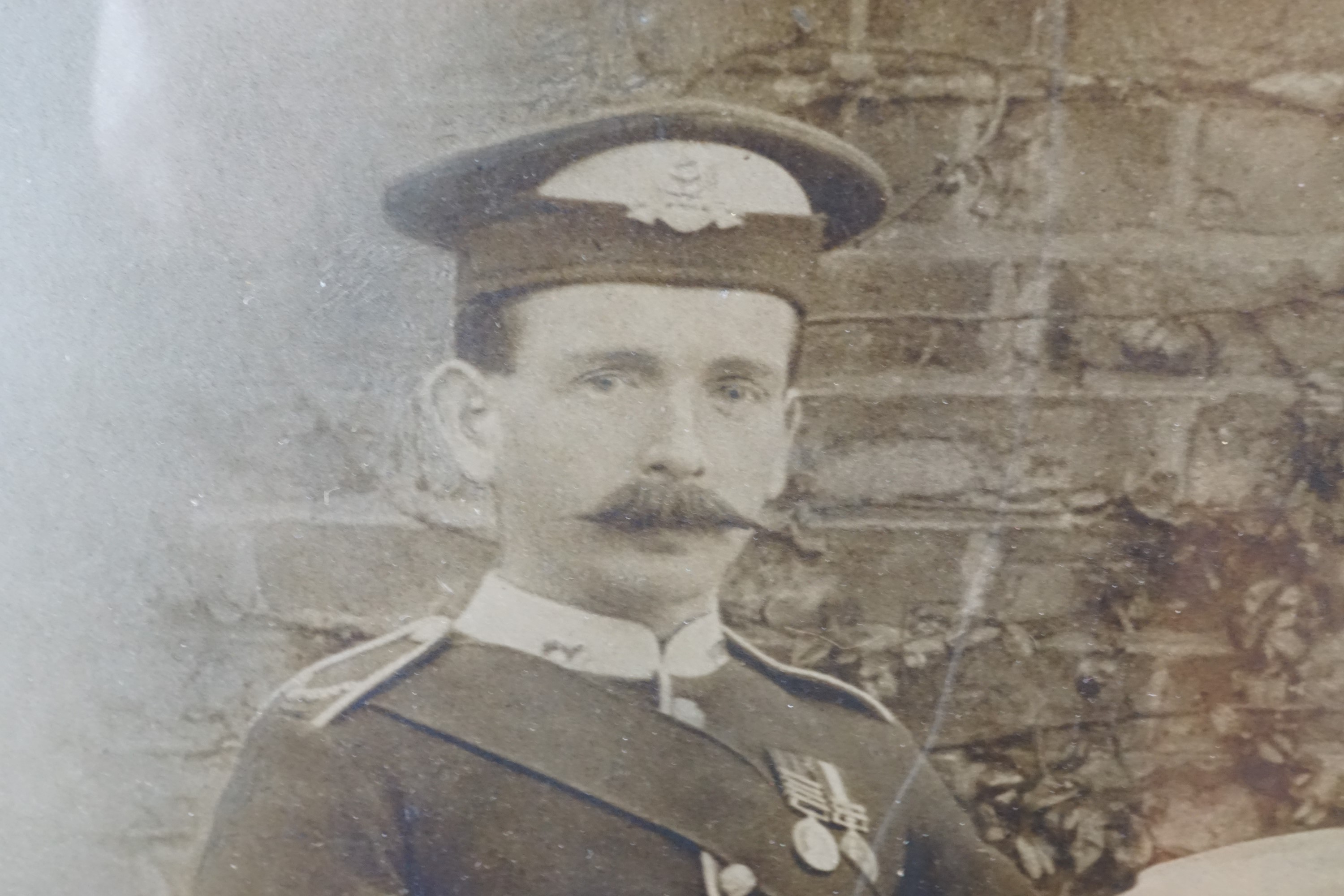 A framed pre Great War photograph of a British soldier wearing a Broderick cap, a framed 1918 army - Image 11 of 16