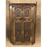 A Victorian carved oak corner cabinet, 103 cm