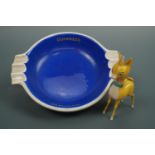 A Carlton Ware Guinness ashtray together with a Babycham promotional deer, circa 1960s