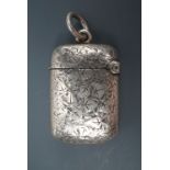 A silver watch chain fob Vesta case of diminutive stature, engraved in an ivy leaf pattern one