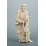 A Meiji Japanese carved ivory okimono depicting a noh actor, 12 cm