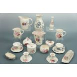 A quantity of Axe Vale pottery including a toast rack, pair of candlesticks, pot pouri lidded