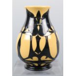 A Moorcroft vase, 10 cm high