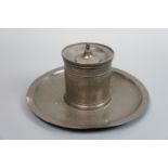 A 19th Century Dutch pewter ink pot, of cylindrical form and having a dished base, touchmarks to