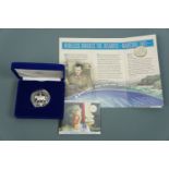 A cased Royal Mint 2002 Queen's Silver Jubilee silver proof crown together with a 2001 transatlantic