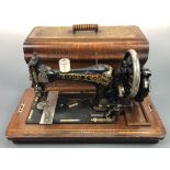 A vintage Suprema table model sewing machine, no 920100