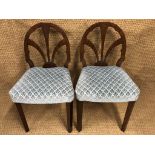 A pair of 1930s Art Deco style mahogany dining chairs