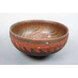 A large ethnic turned and painted wooden bowl, 32 cm