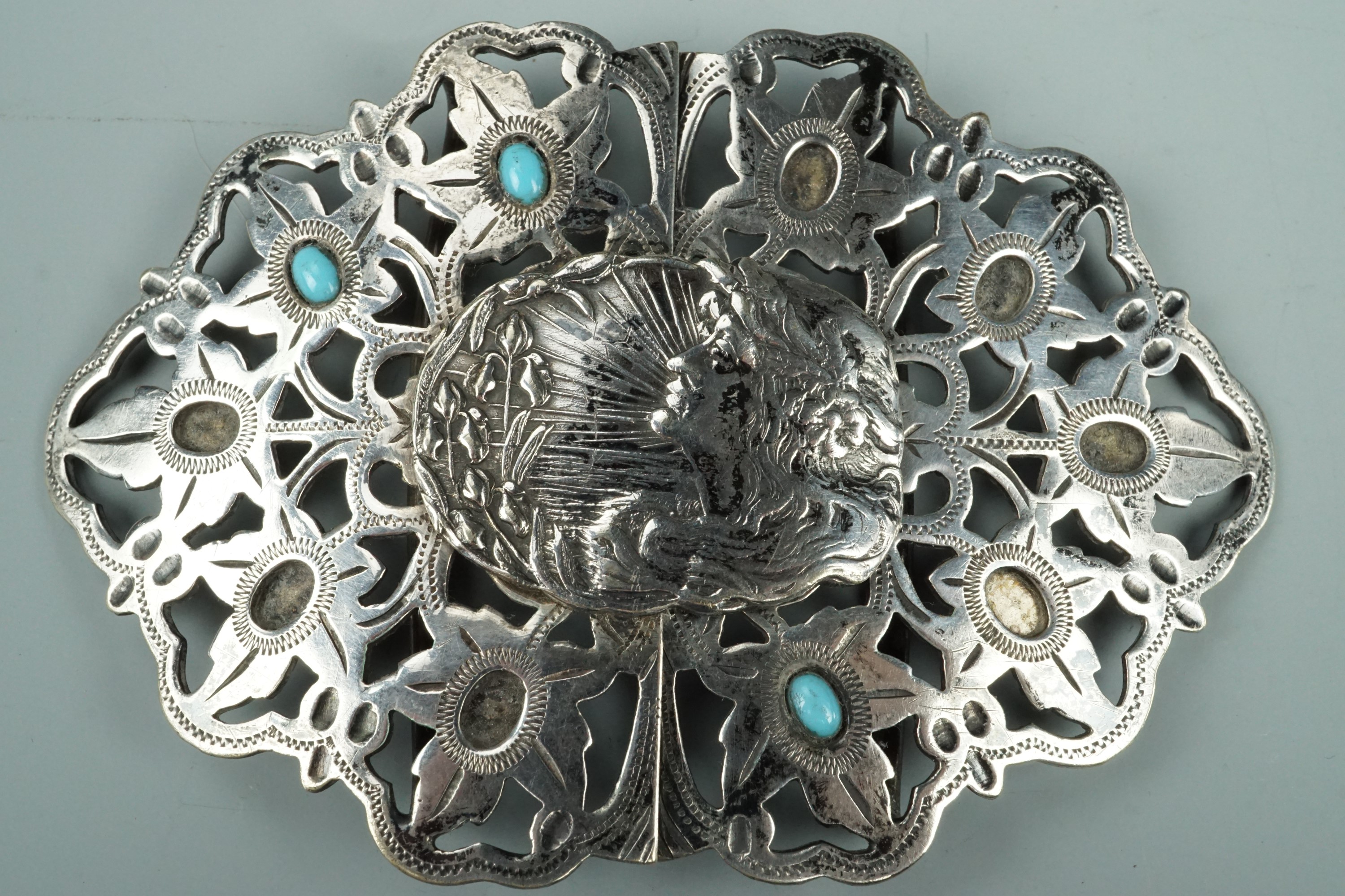 A Belle Epoque electroplate Art Nouveau belt buckle, 9 cm x 6 cm