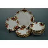 Royal Albert Old Country Rose cake plate, six tea plates and six bowls