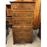 A quality old reproduction Georgian walnut bow fronted chest-on-chest, of diminutive stature, 138