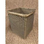 A lloyd Loom waste paper basket