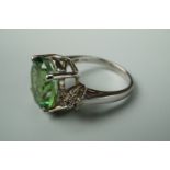 A contemporary fern green quartz and white topaz dress ring, on sterling silver, size R 1/2, with