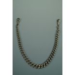 An antique silver single graded curb link watch chain with two swivels, 31 cm
