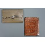 A Victorian silver-mounted grey leather purse and a similar wallet