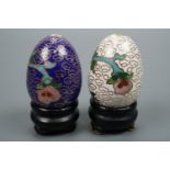 Two small cloisonné eggs on stands, 4 cm high