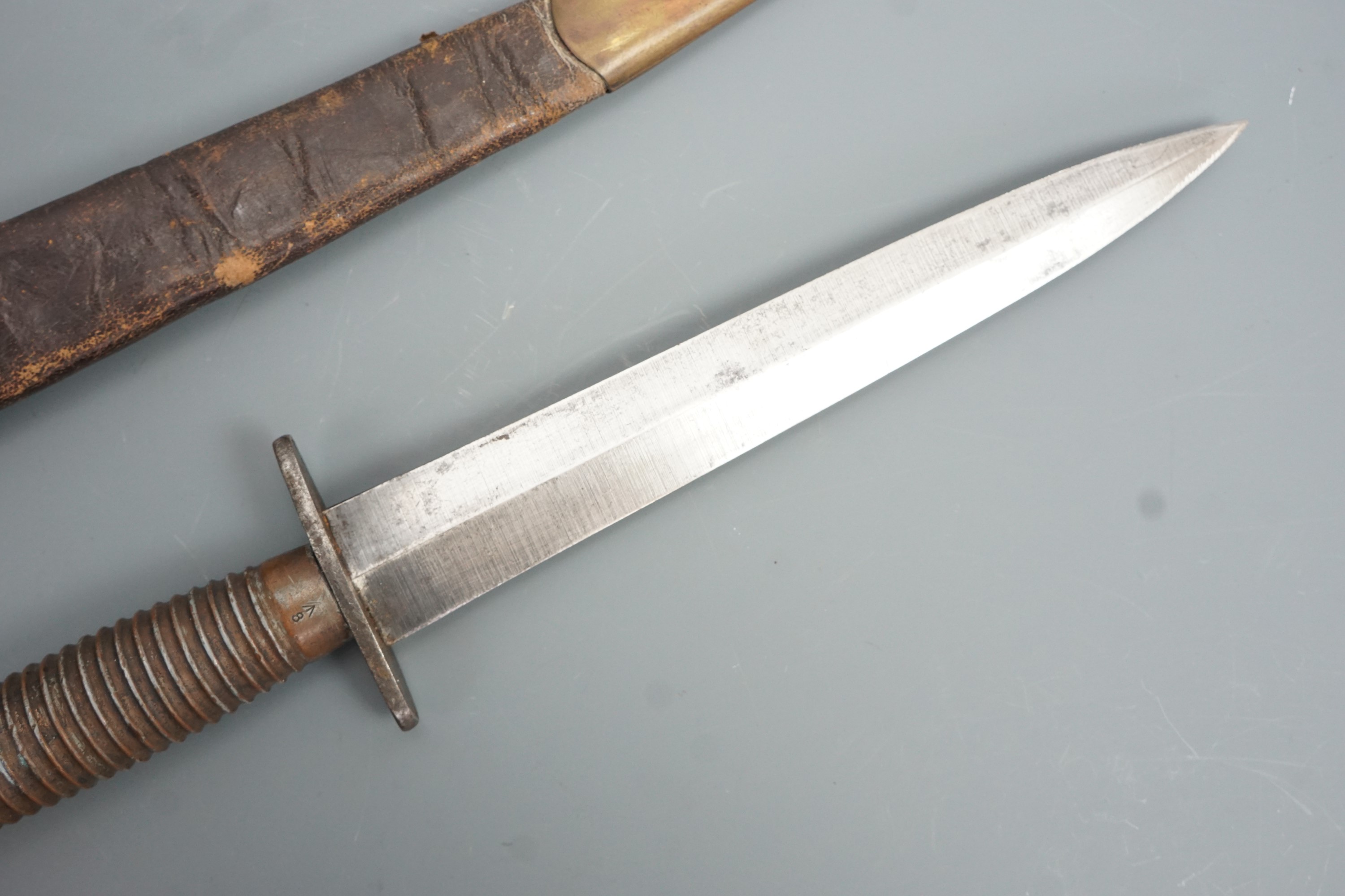 A Second World War British military third pattern FS / Fairbairn Sykes fighting knife, the grip - Image 2 of 2