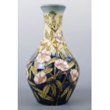 A signed limited edition Moorcroft vase, 48/75, C E Sneyd, c 2003, 20 cm high