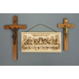 Two crucifixes and a relief plaque depicting Da Vinci's "The Last Supper"