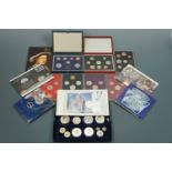A quantity of UK Royal Mint coin year sets, commemorative coin packs etc
