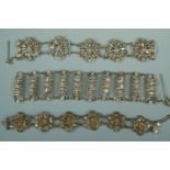 Three continental white-metal filigree bracelets, 88.3g