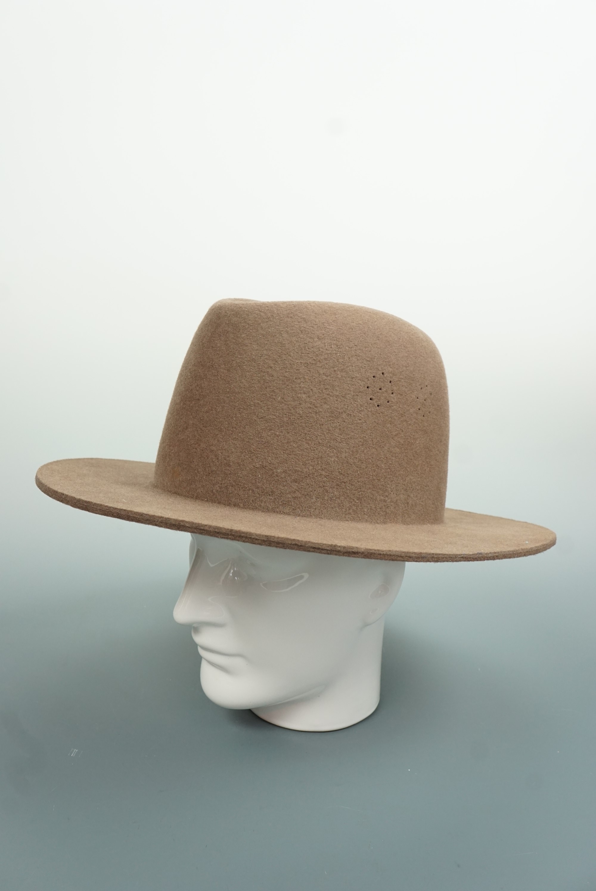 An un-issued post-War British army Gurkha bush hat, bearing a NATO stores reference label, size 58