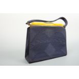 A 1940s 'Genuine Corde Product' lady's handbag, in French blue with butterscotch Bakelite cantle,