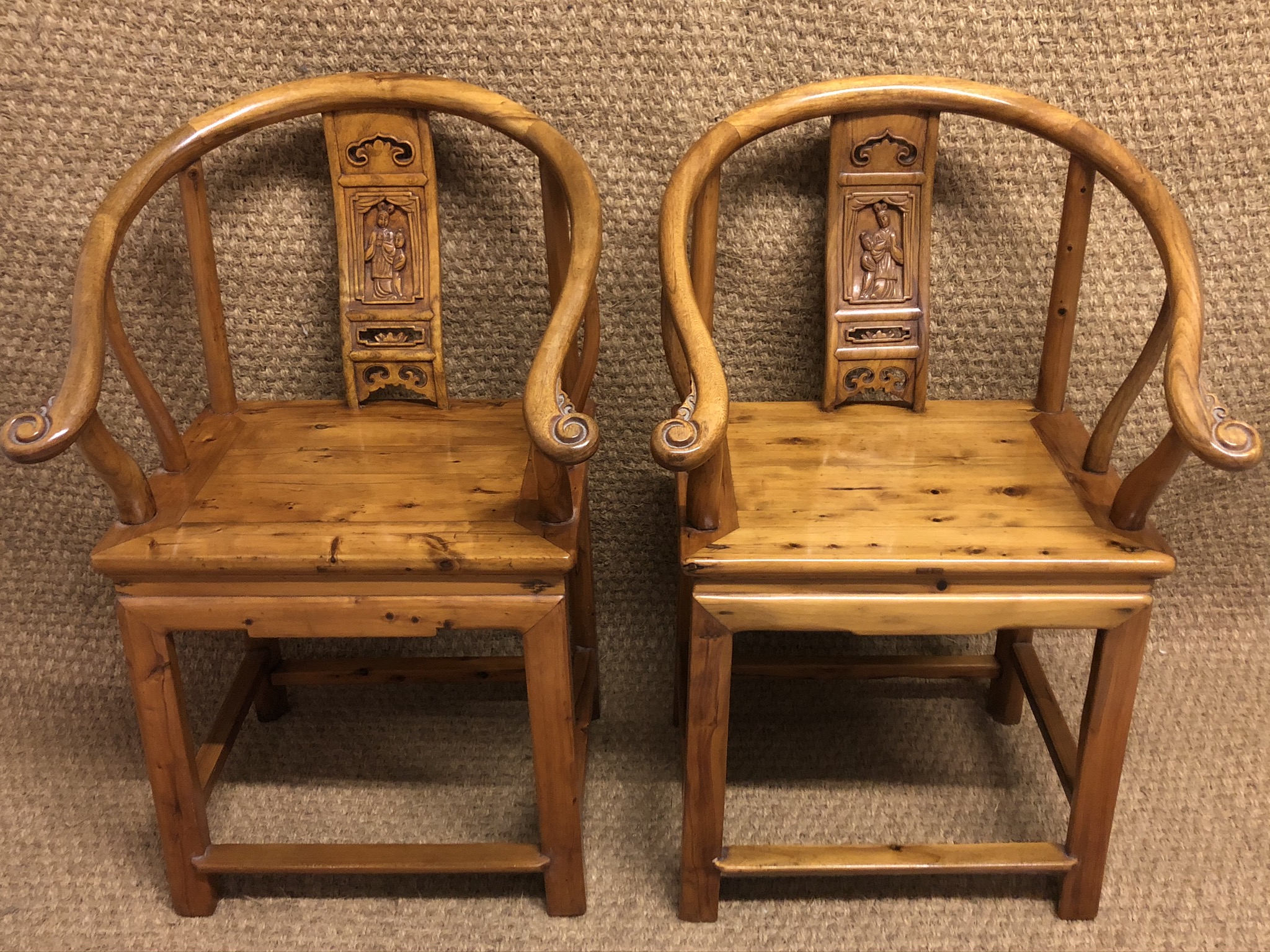 A pair of traditional Chinese armchairs