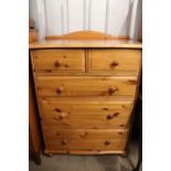 A contemporary pine chest of drawers, 84 cm x 45 cm x 114 cm