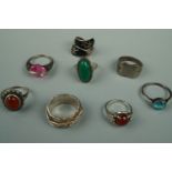 Silver and other finger rings including a Siamese niello wrap-around ring and a signet ring with